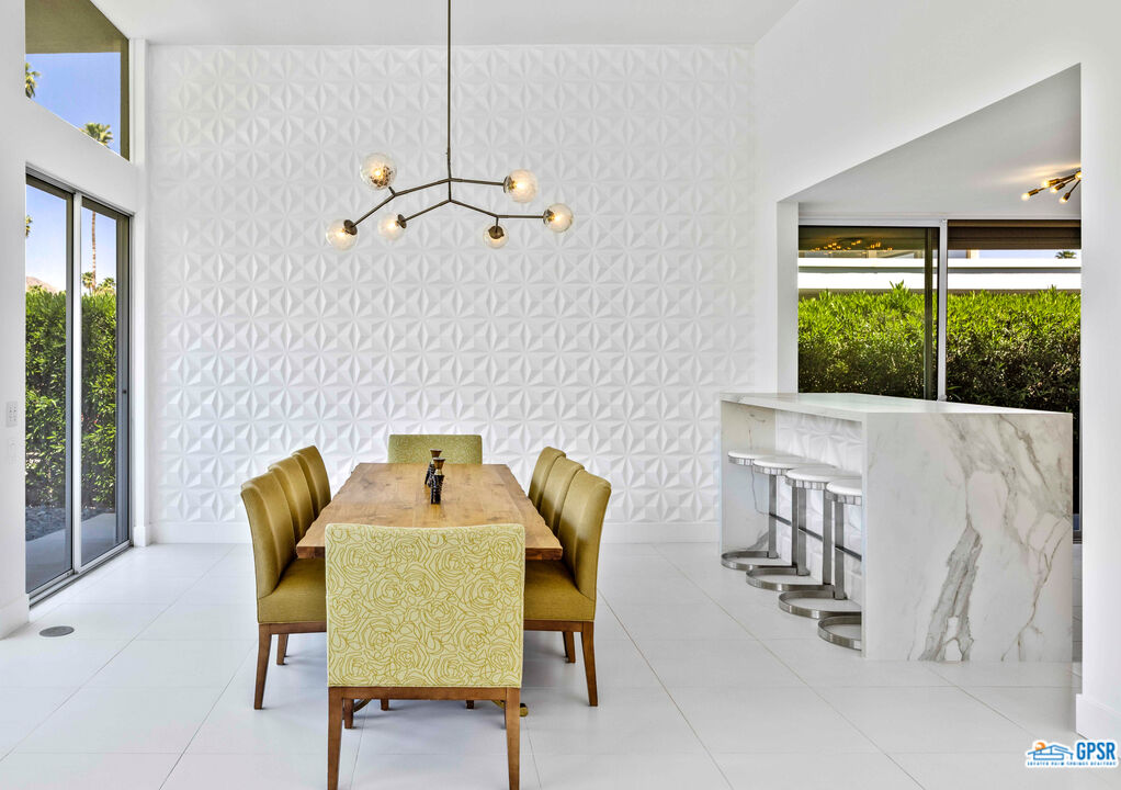 2649 Kings Road West Palm Springs, CA 92264 - Photo 22 of 50 a dining room with furniture and a window