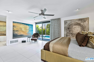 2649 Kings Road West Palm Springs, CA 92264 - Photo 28 of 50 a living room with furniture and a flat screen tv