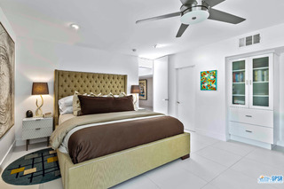 2649 Kings Road West Palm Springs, CA 92264 - Photo 29 of 50 a bedroom with a bed and a window