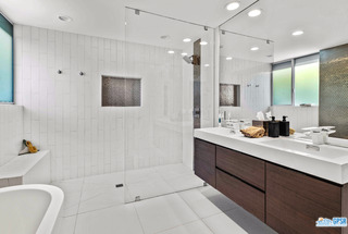 2649 Kings Road West Palm Springs, CA 92264 - Photo 32 of 50 a bathroom with a double vanity sink toilet and shower