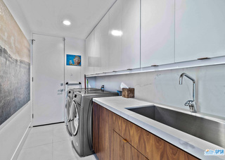 2649 Kings Road West Palm Springs, CA 92264 - Photo 48 of 50 a kitchen with a sink a refrigerator and cabinets