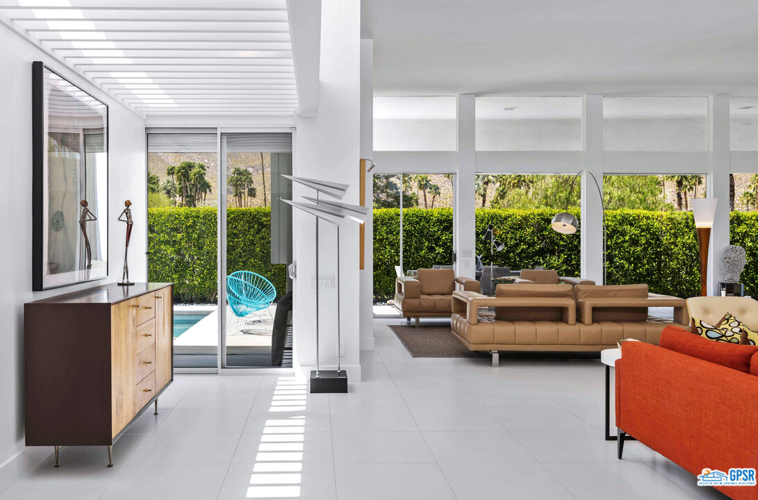 2649 Kings Road West Palm Springs, CA 92264 - Photo 9 of 50 a living room with furniture and a large window