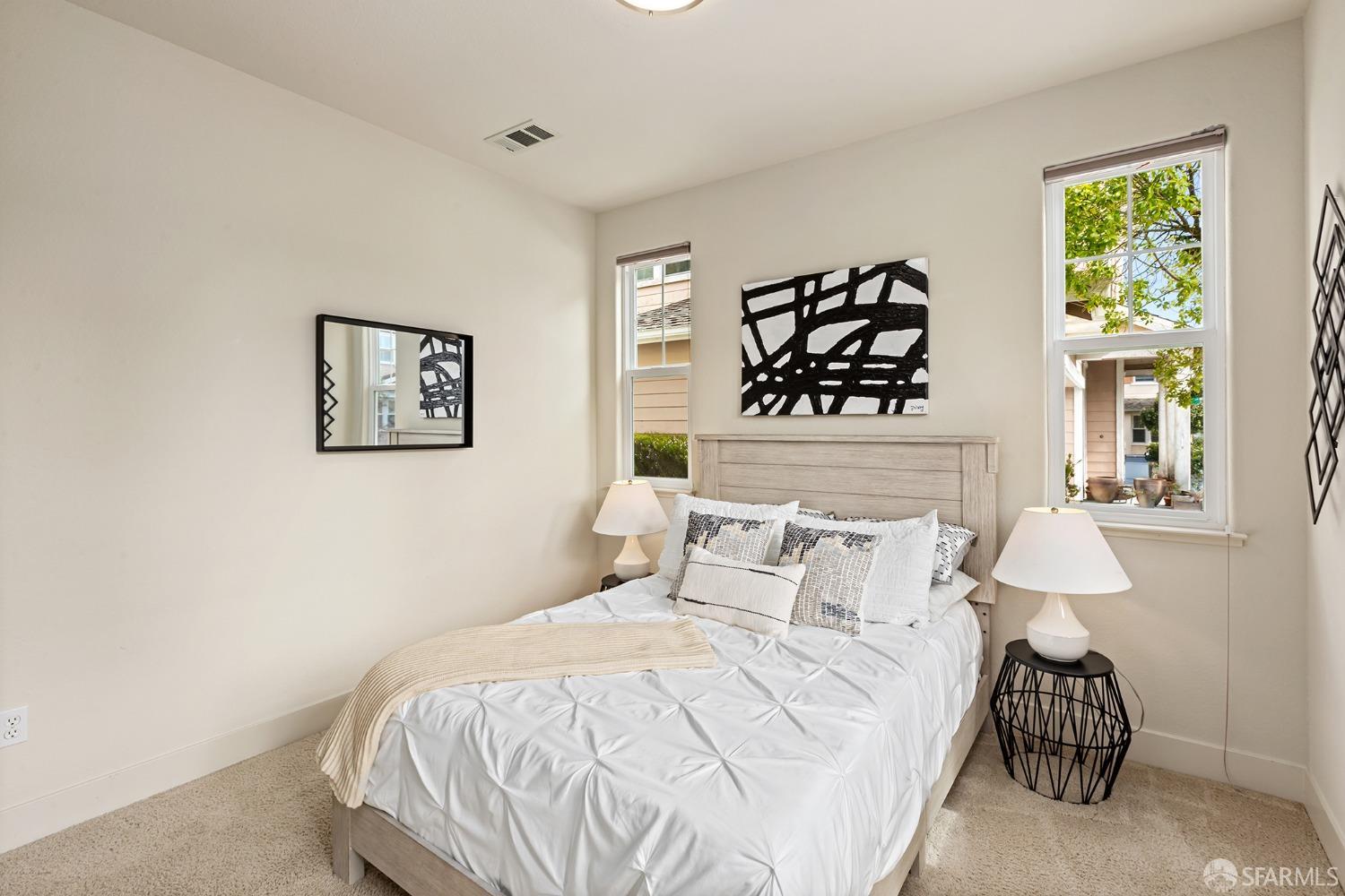 119 Cypress Street Pacifica, CA 94044 - Photo 16 of 30 a bedroom with a bed and a window