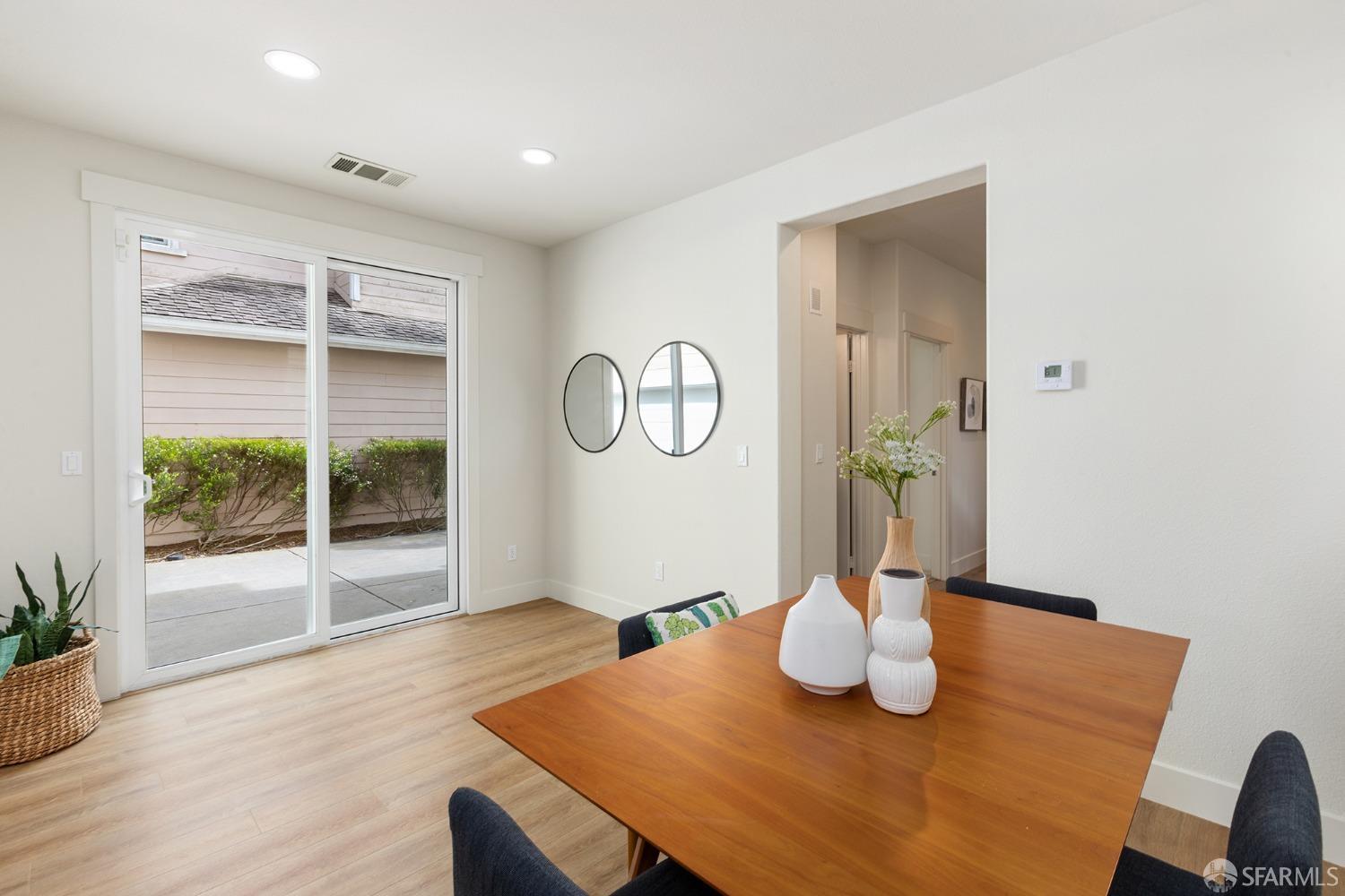 119 Cypress Street Pacifica, CA 94044 - Photo 5 of 30 a view of a dining room with furniture window and wooden floor