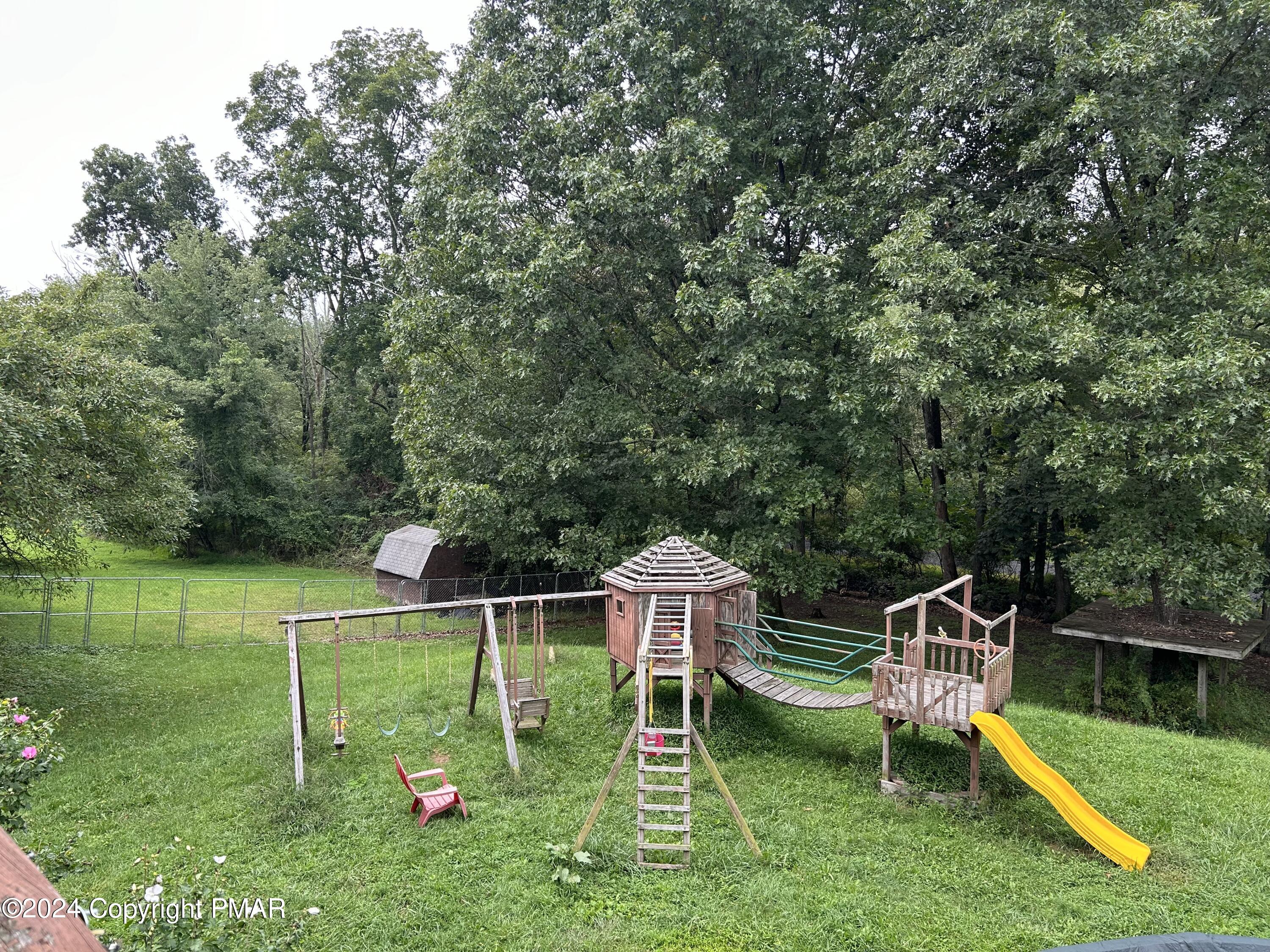 234 Shiffer Road Stroudsburg, PA 18360 - Photo 14 of 14 a childrens park with lots of swings and slides