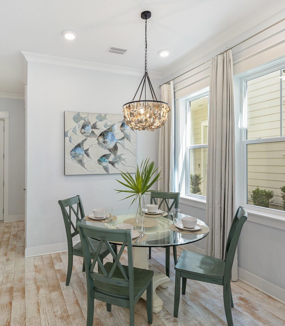 296 Milestone Dr Inlet Beach, Unit A Inlet Beach, FL 32461 - Photo 15 of 41 a dining room with furniture and window
