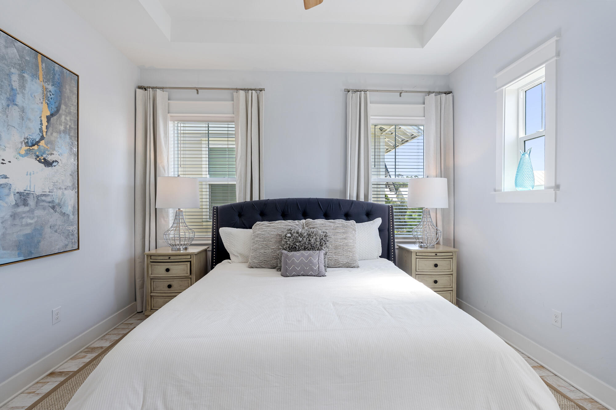 296 Milestone Dr Inlet Beach, Unit A Inlet Beach, FL 32461 - Photo 16 of 41 a bedroom with a large bed and a window