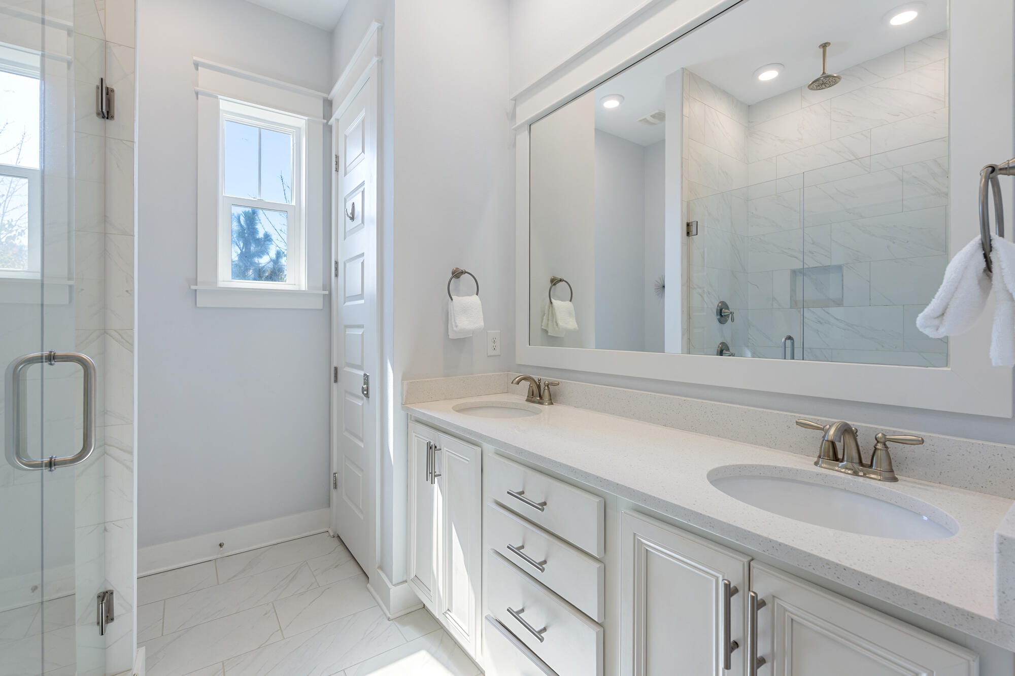 296 Milestone Dr Inlet Beach, Unit A Inlet Beach, FL 32461 - Photo 18 of 41 a bathroom with a double vanity sink mirror and double