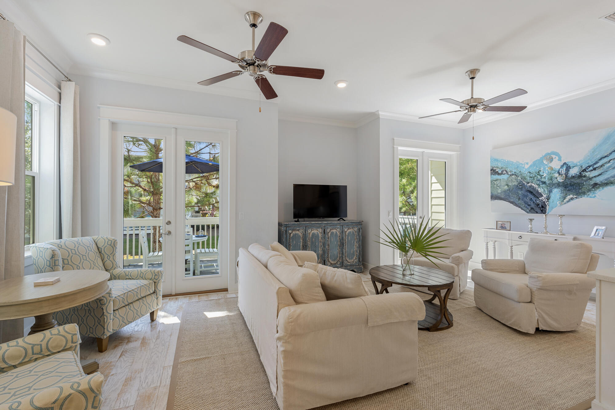 296 Milestone Dr Inlet Beach, Unit A Inlet Beach, FL 32461 - Photo 2 of 41 a living room with furniture and a large window