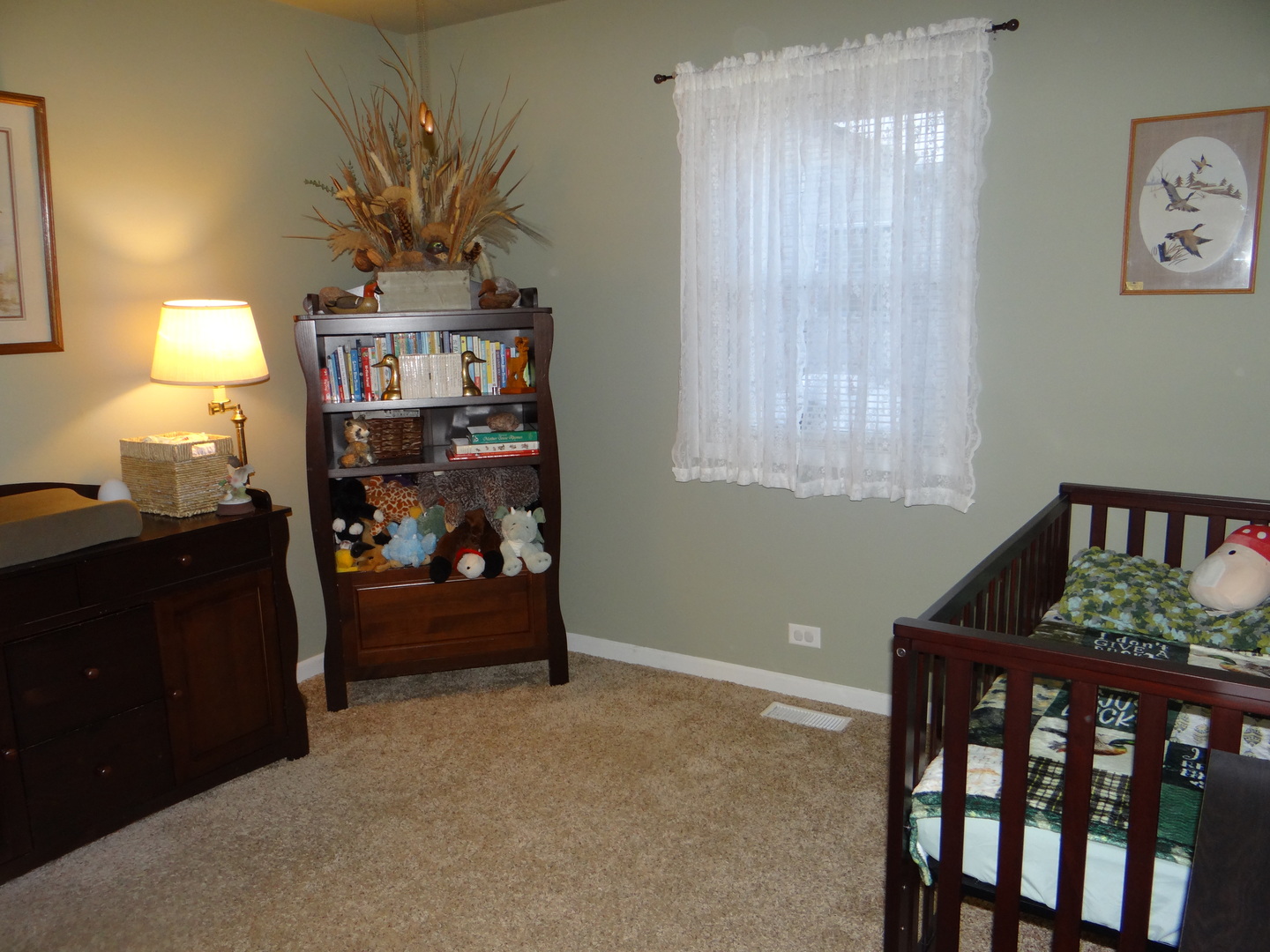 809 Douglas Street Morris, IL 60450 - Photo 13 of 22 a bedroom with furniture closet and a window