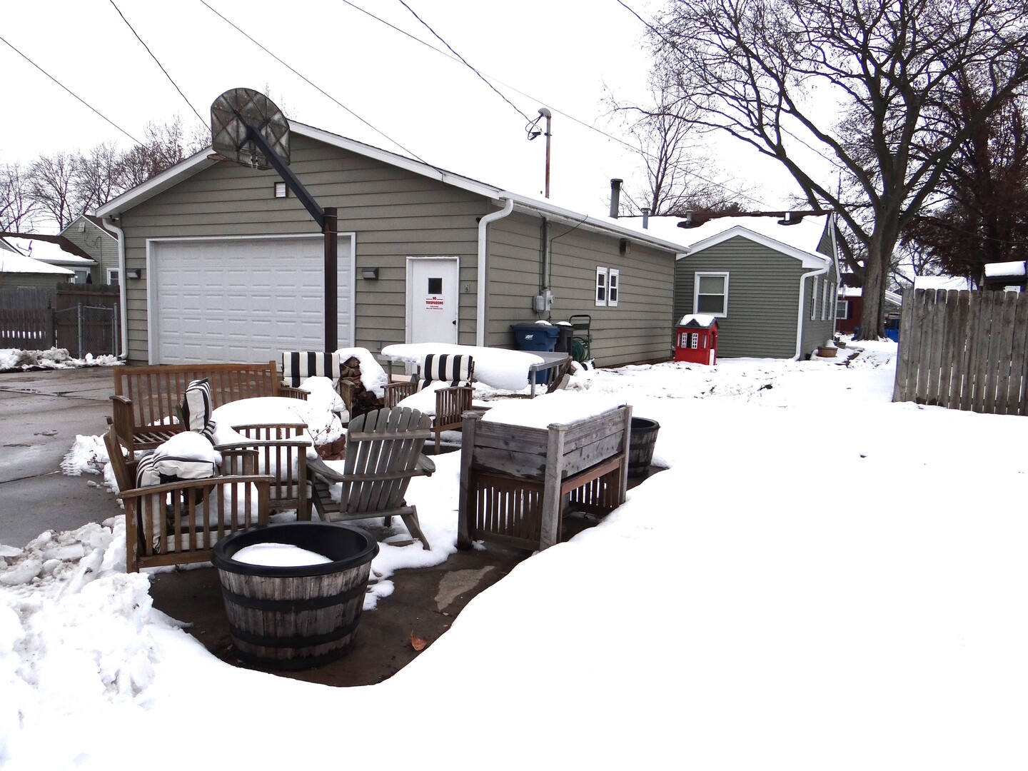 809 Douglas Street Morris, IL 60450 - Photo 20 of 22 a view of a patio with couches chairs and a fire pit