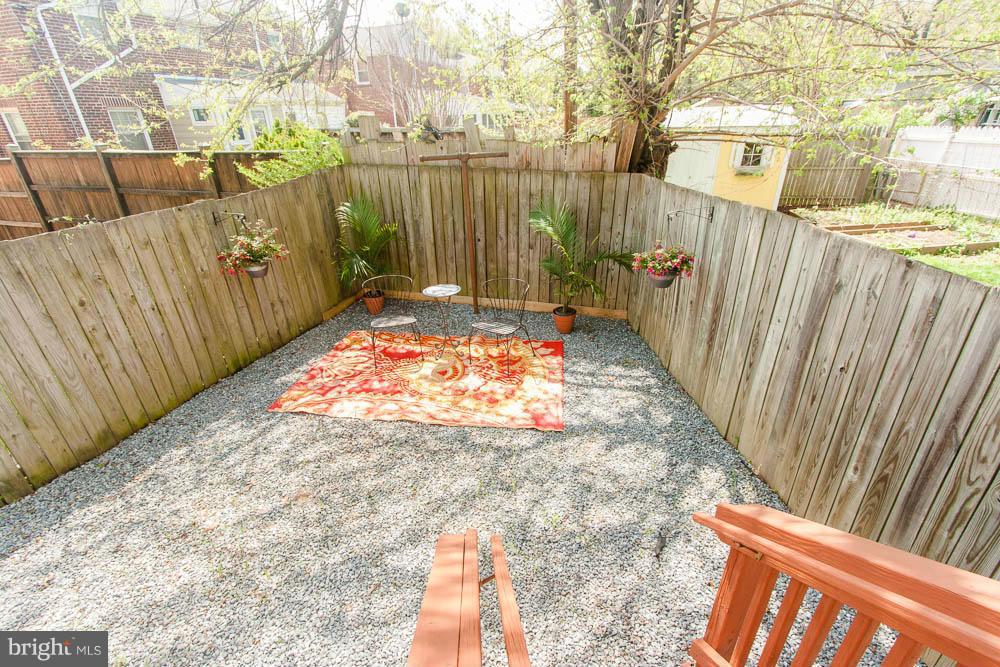 106 South Glebe Road Arlington, VA 22204 - Photo 15 of 28 a view of a backyard with wooden fence