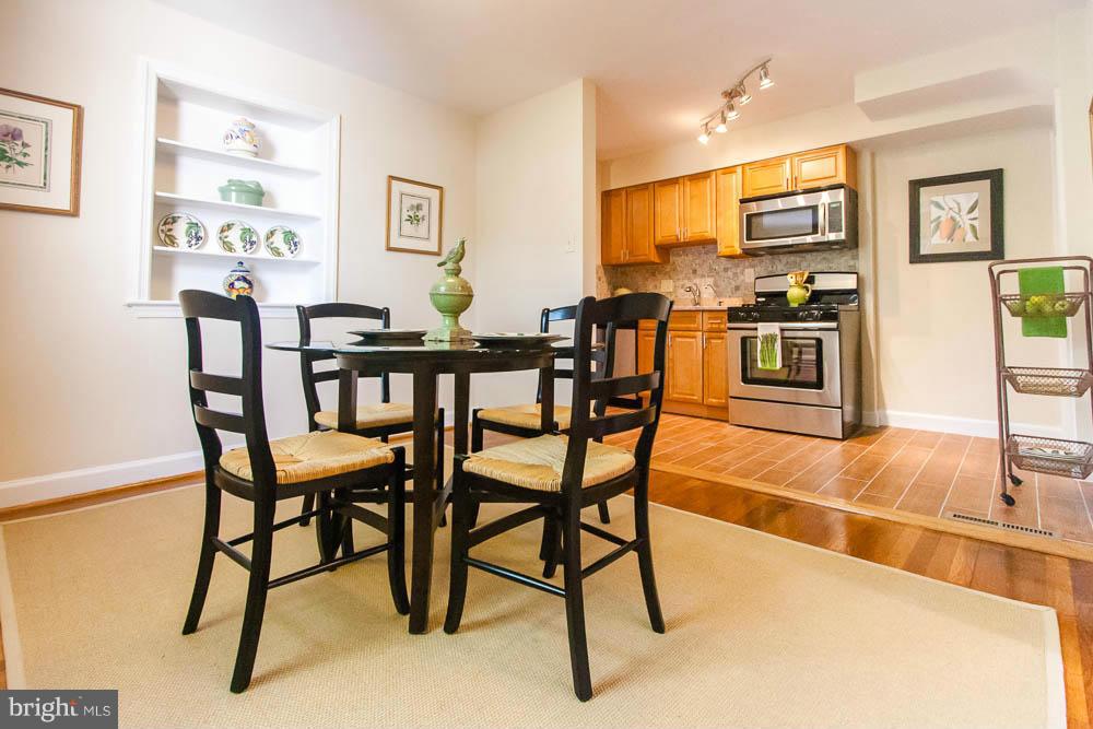 106 South Glebe Road Arlington, VA 22204 - Photo 10 of 28 a view of a dining room with furniture