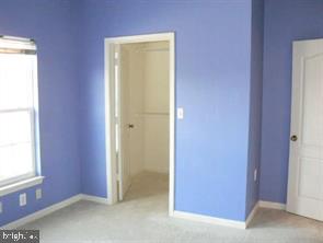 538 Rhapsody Court, Unit 538 Cockeysville, MD 21030 - Photo 21 of 30 Charming blue-walled room with light.