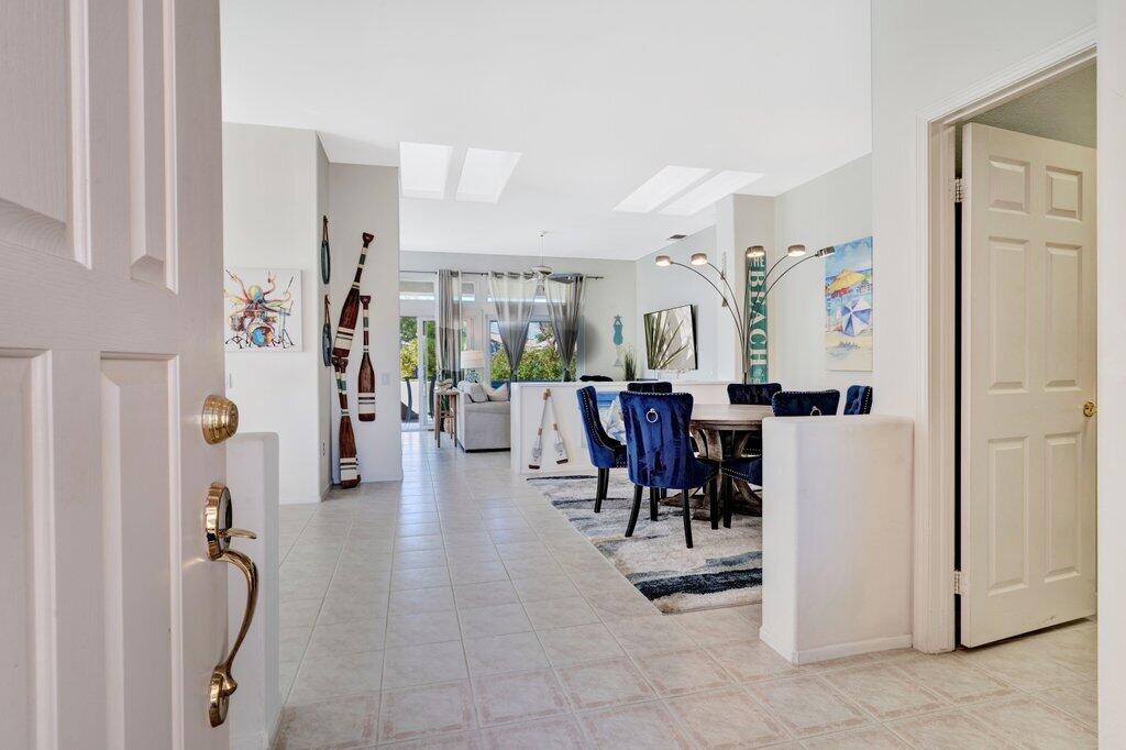 38635 Orangecrest Road Palm Desert, CA 92211 - Photo 1 of 34 a view of a dining area with furniture and a kitchen
