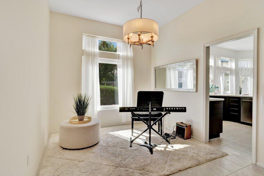 38635 Orangecrest Road Palm Desert, CA 92211 - Photo 11 of 34 a view of a livingroom with furniture and a window