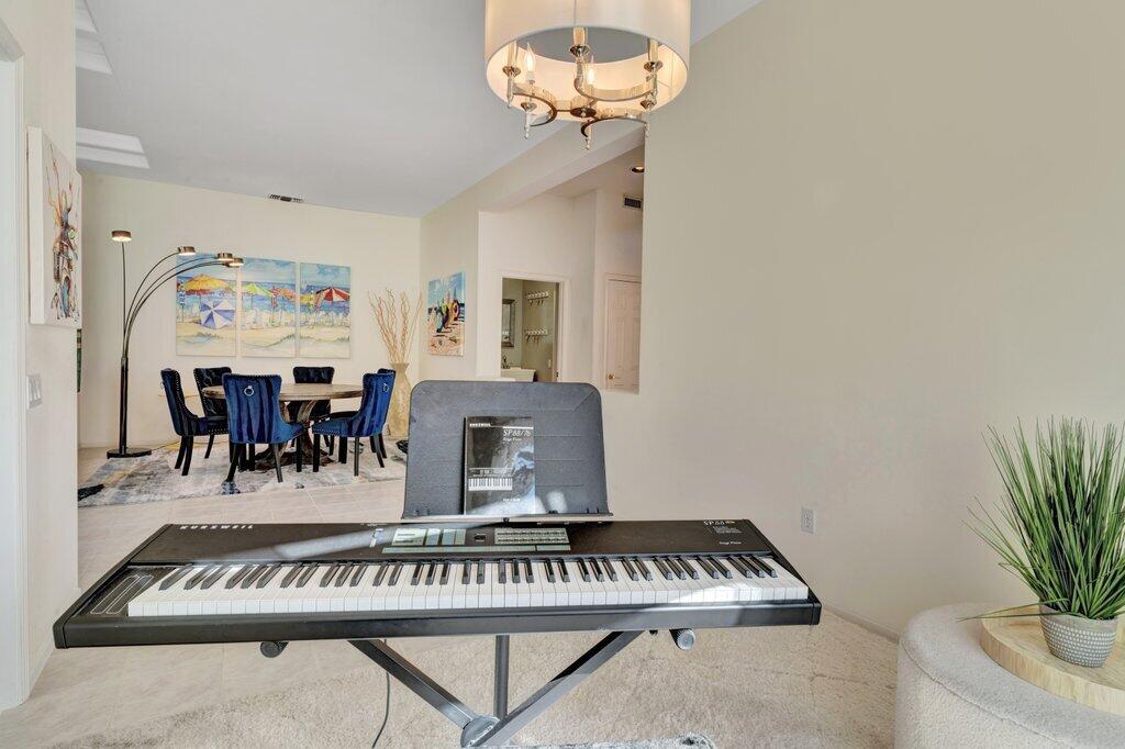 38635 Orangecrest Road Palm Desert, CA 92211 - Photo 12 of 34 a view of a dining room with furniture