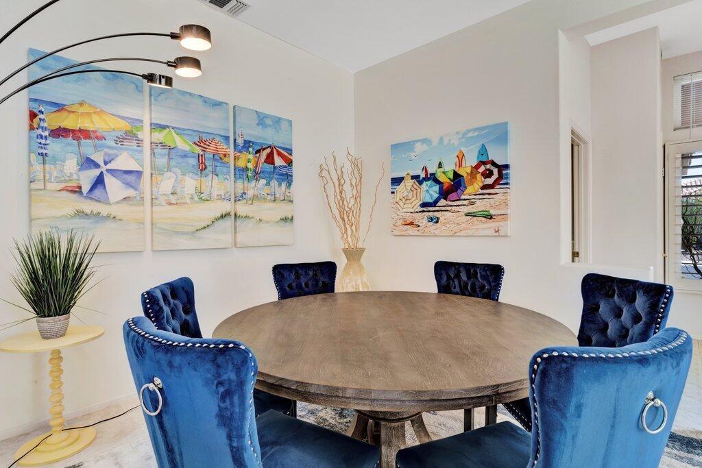 38635 Orangecrest Road Palm Desert, CA 92211 - Photo 2 of 34 a living room with furniture and a potted plant