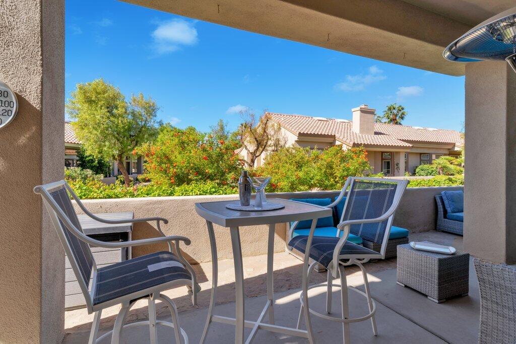 38635 Orangecrest Road Palm Desert, CA 92211 - Photo 24 of 34 a view of balcony with chairs and a table