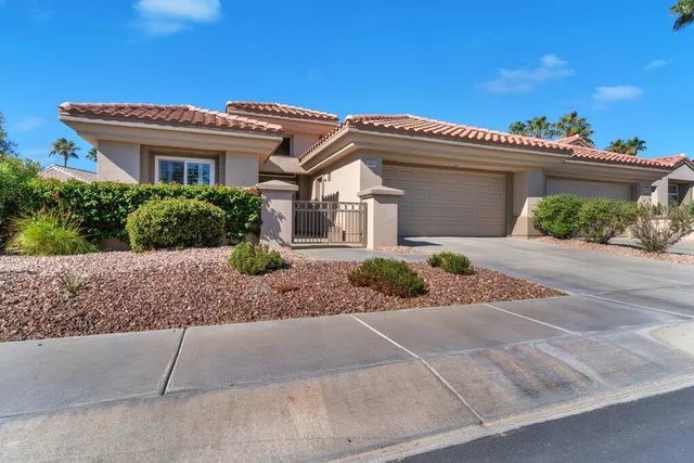 front view of a house and a yard