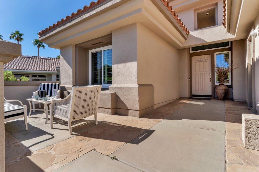 38635 Orangecrest Road Palm Desert, CA 92211 - Photo 30 of 34 a view of a patio with table and chairs
