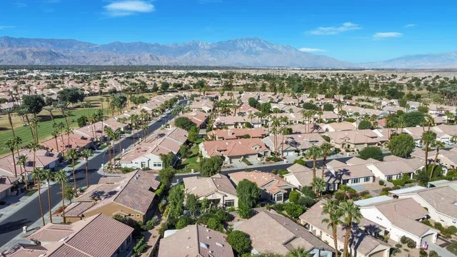 an aerial view of a city with lots of residential buildings