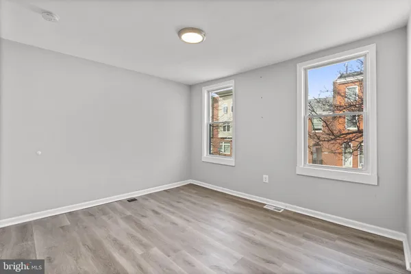 an empty room with windows