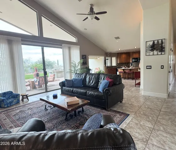 a large room with a couch and a view of living room