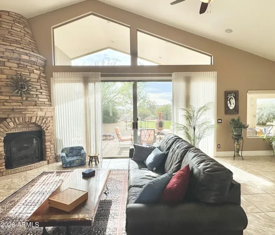 a living room with furniture or couch and a window