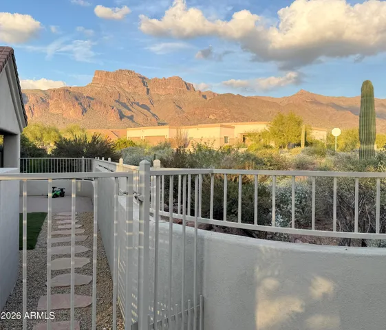 a view of a city with tall trees