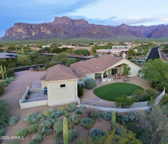 a view of a hallway with wooden walls