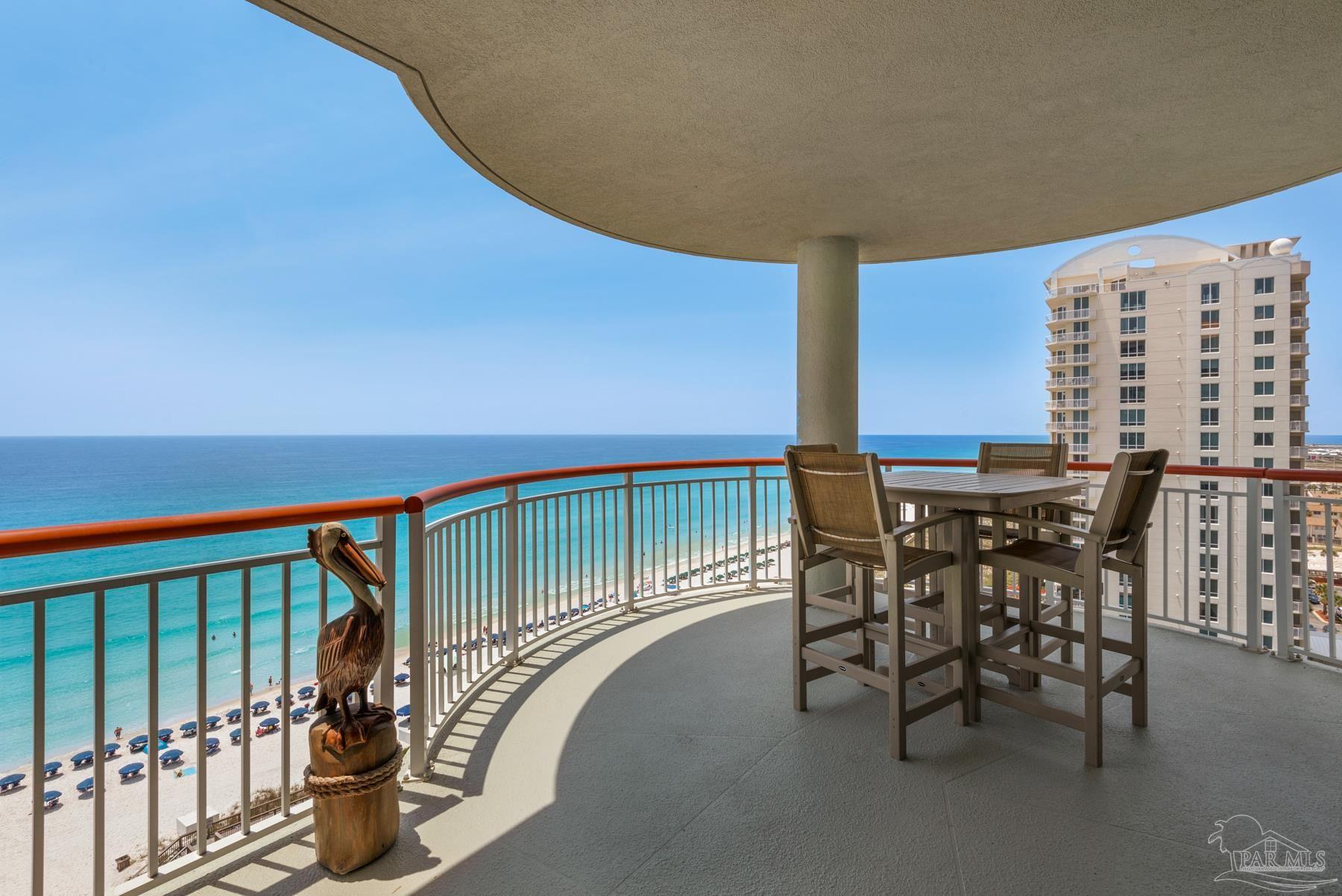 a view of a chairs and table in the patio