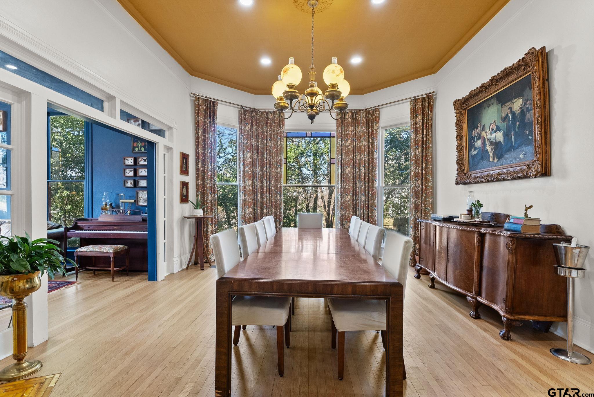 911 West Houston Street Tyler, TX 75702 - Photo 14 of 48 a view of a dining room with furniture window and wooden floor
