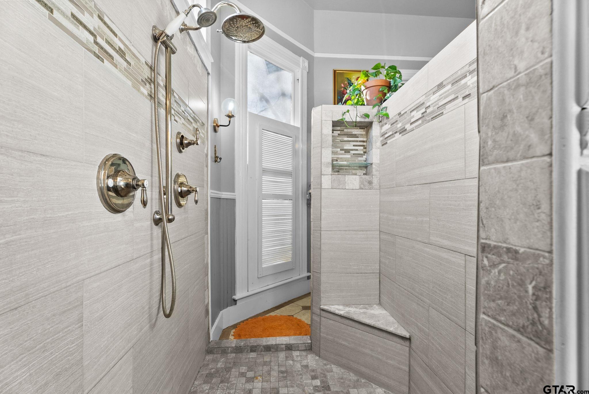 911 West Houston Street Tyler, TX 75702 - Photo 25 of 48 a bathroom with a shower