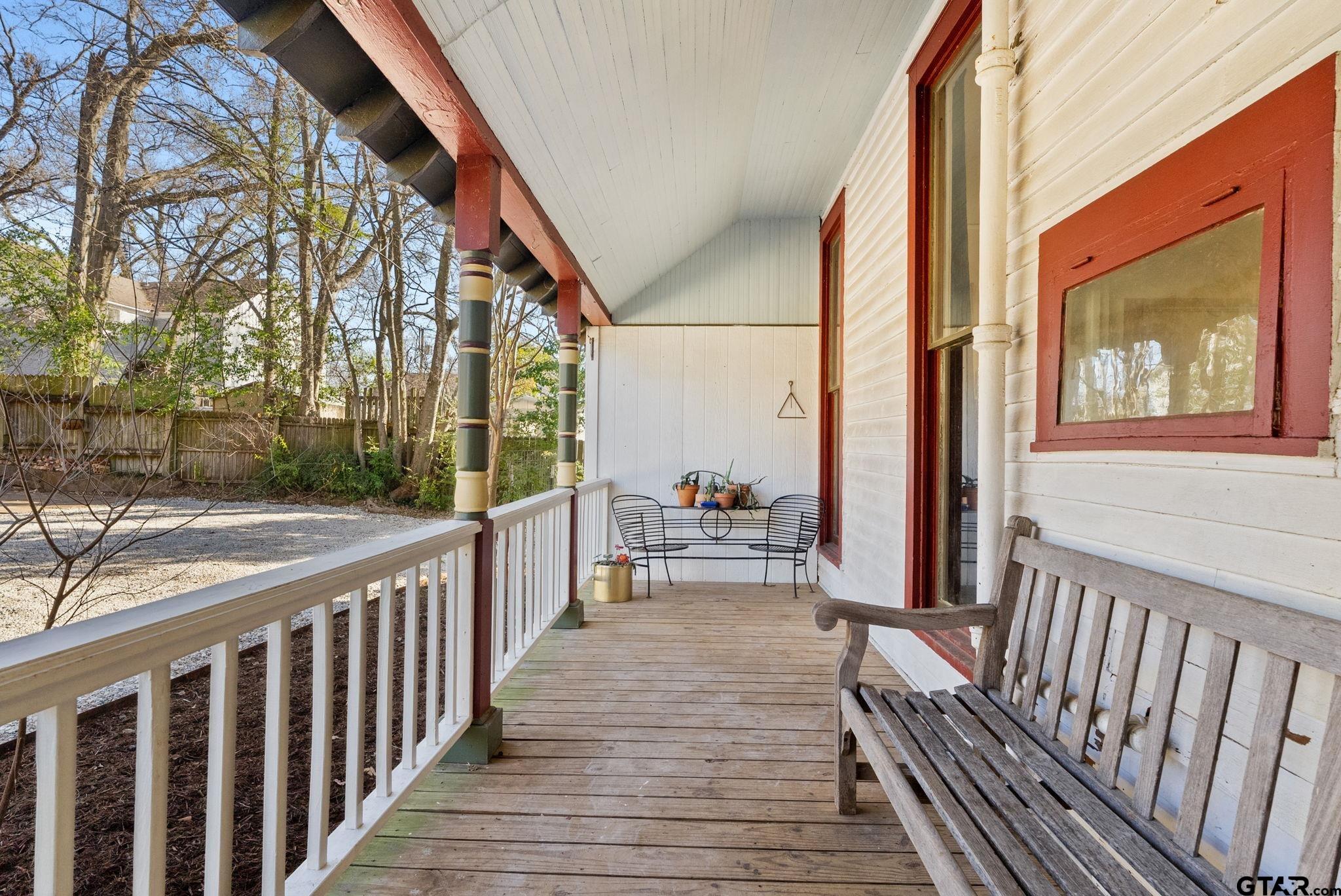 911 West Houston Street Tyler, TX 75702 - Photo 38 of 48 a view of balcony with wooden floor