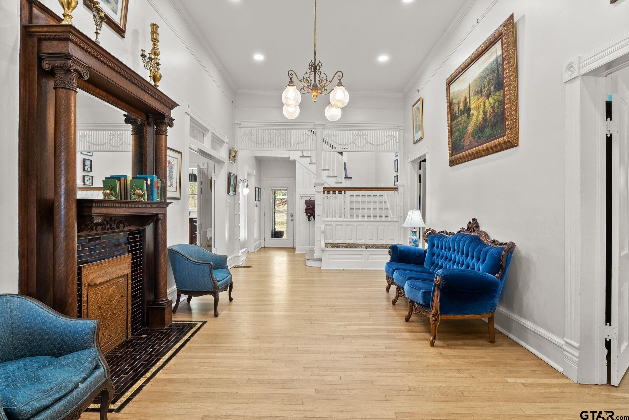 911 West Houston Street Tyler, TX 75702 - Photo 7 of 48 a living room with furniture piano and a rug