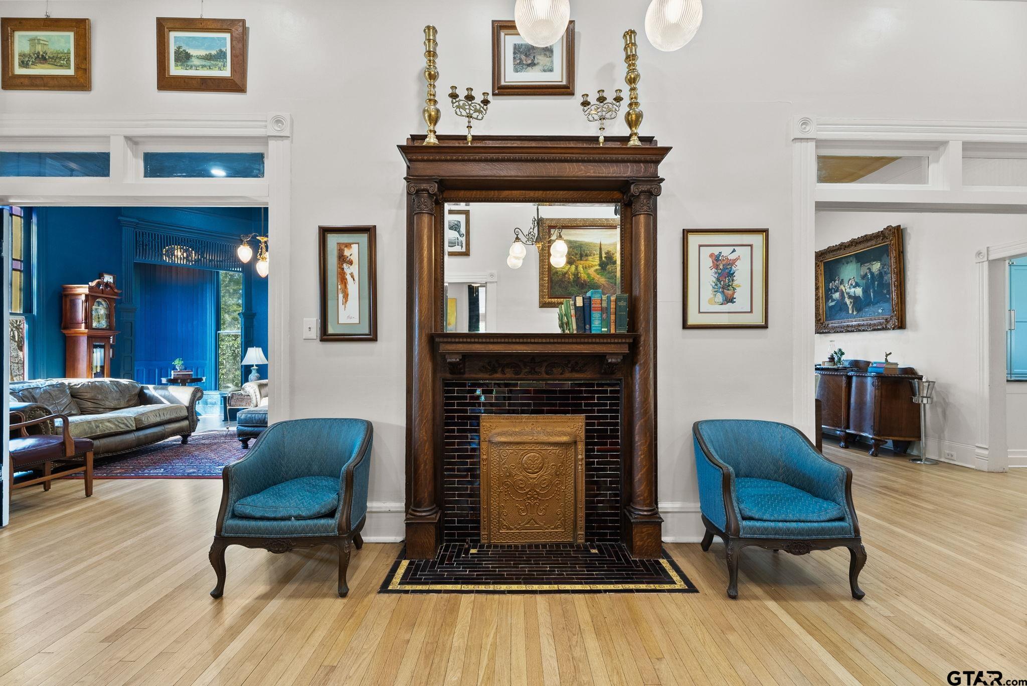 911 West Houston Street Tyler, TX 75702 - Photo 9 of 48 a living room with furniture and a fireplace