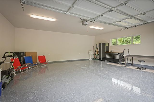 a room with stairs and a table