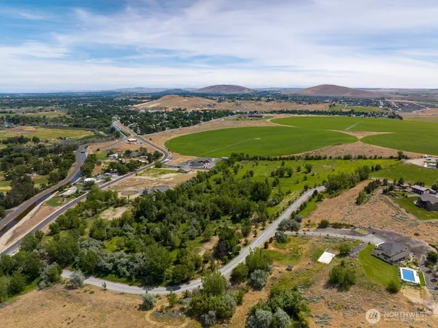 a view of a city with a lake