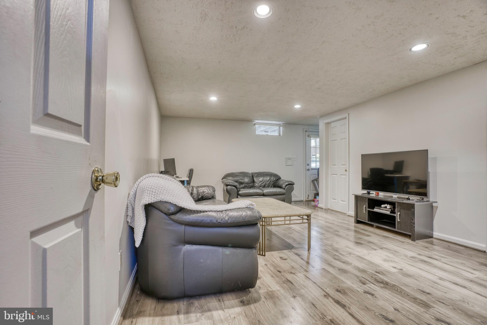 20 Powder View Court Baltimore, MD 21236 - Photo 26 of 37 Lower level family room w walk out