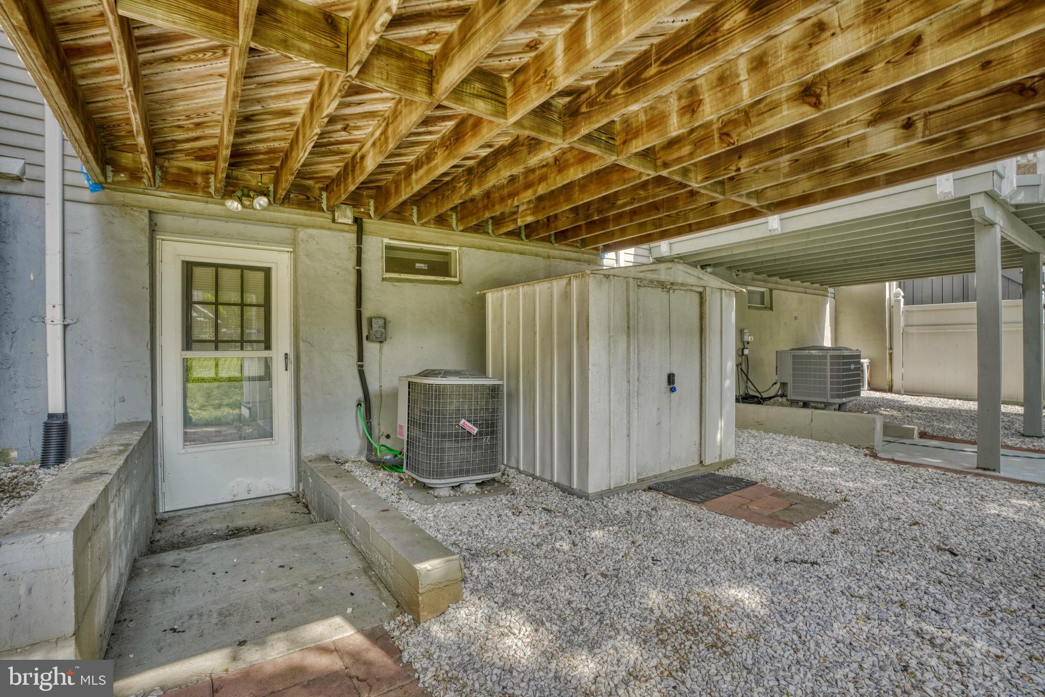 20 Powder View Court Baltimore, MD 21236 - Photo 36 of 37 Under the deck, patio area with shed