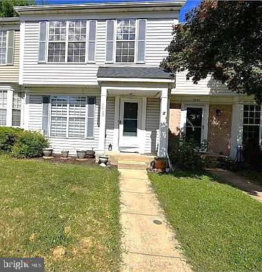 Charming two-story home with curb appeal.