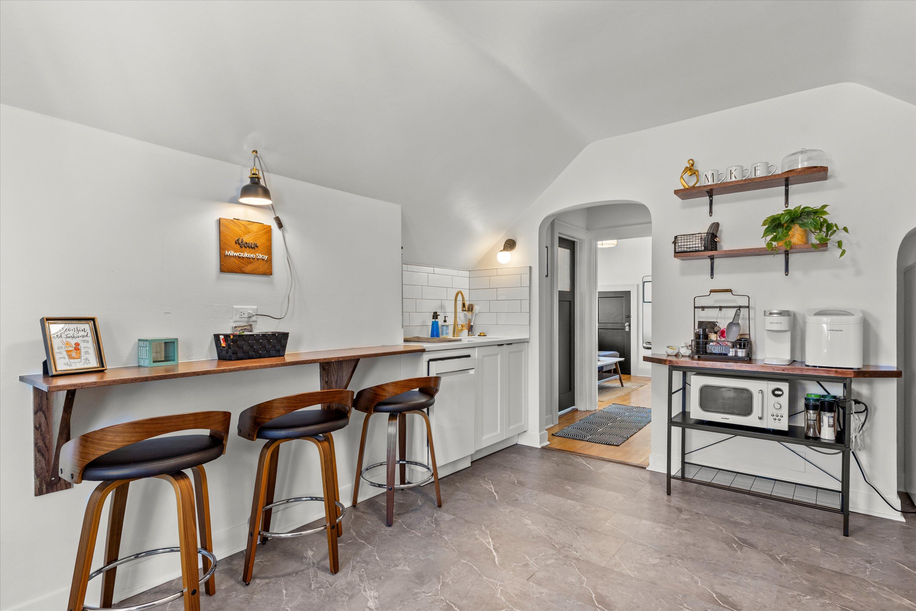 159 North 59th Street Milwaukee, WI 53213 - Photo 6 of 34 Kitchen with dining area and stylish details