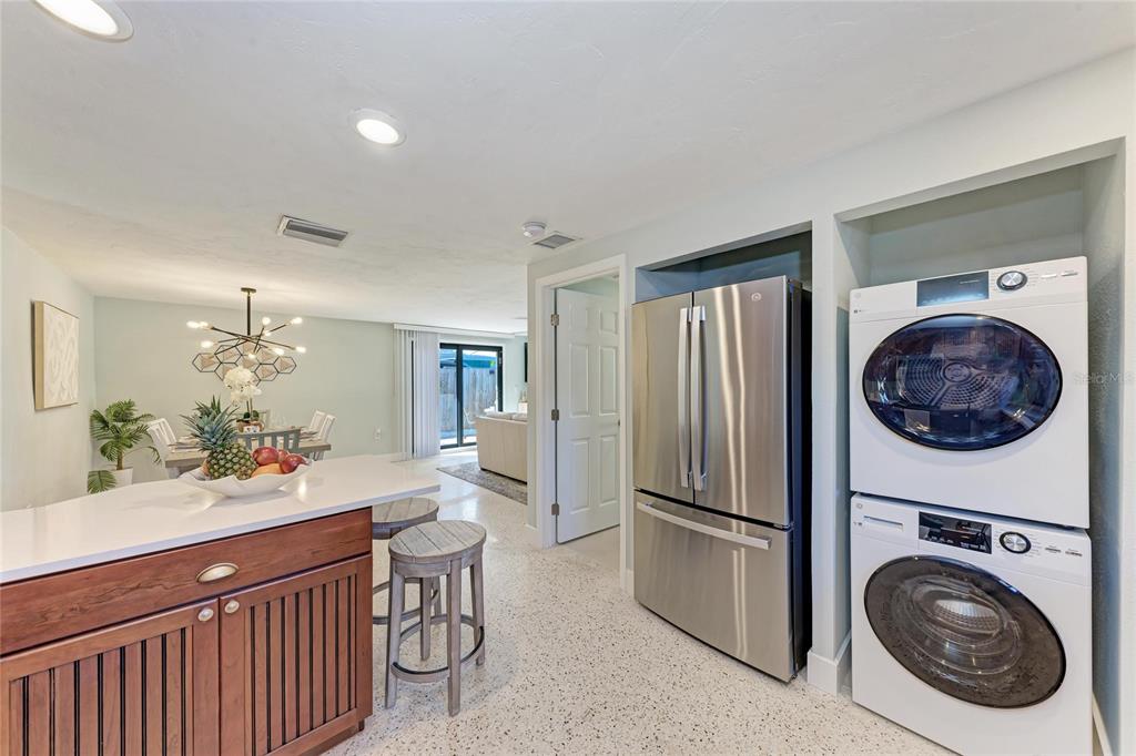 730 Fox Street Longboat Key, FL 34228 - Photo 18 of 40 a kitchen with stainless steel appliances granite countertop a refrigerator and a stove