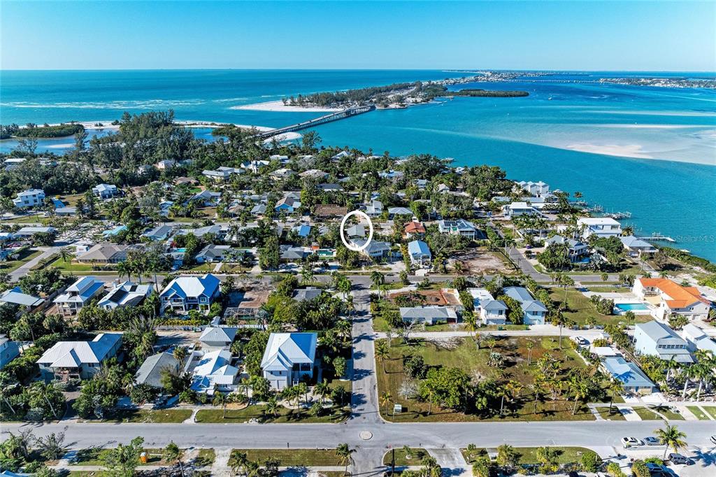 730 Fox Street Longboat Key, FL 34228 - Photo 6 of 40 an aerial view of residential building and ocean