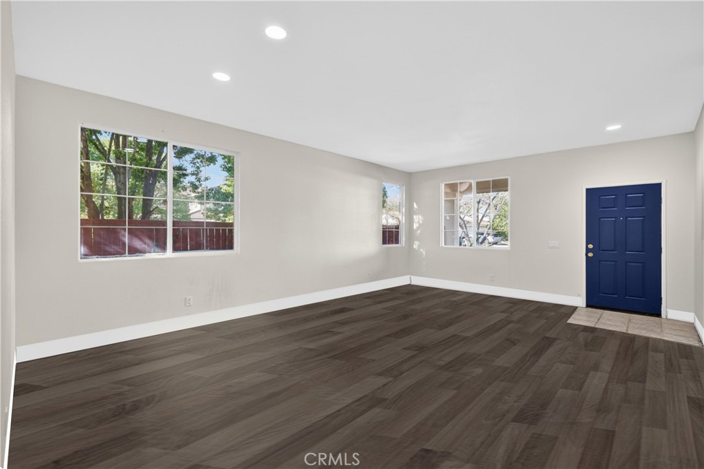 24501 Corte Rojelio Murrieta, CA 92562 - Photo 17 of 34 This is a conceptual photo to show what the home would look like with Vinyl Hardwood flooring.