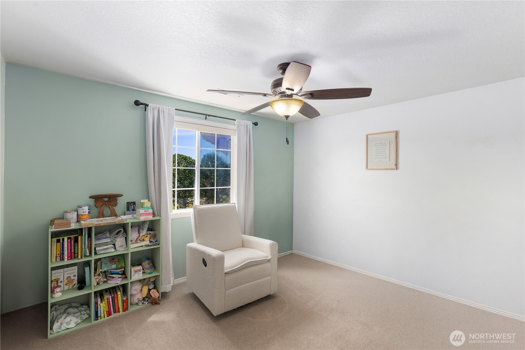 8305 Sweetbrier Loop Southeast Olympia, WA 98513 - Photo 22 of 40 a living room with furniture and a window
