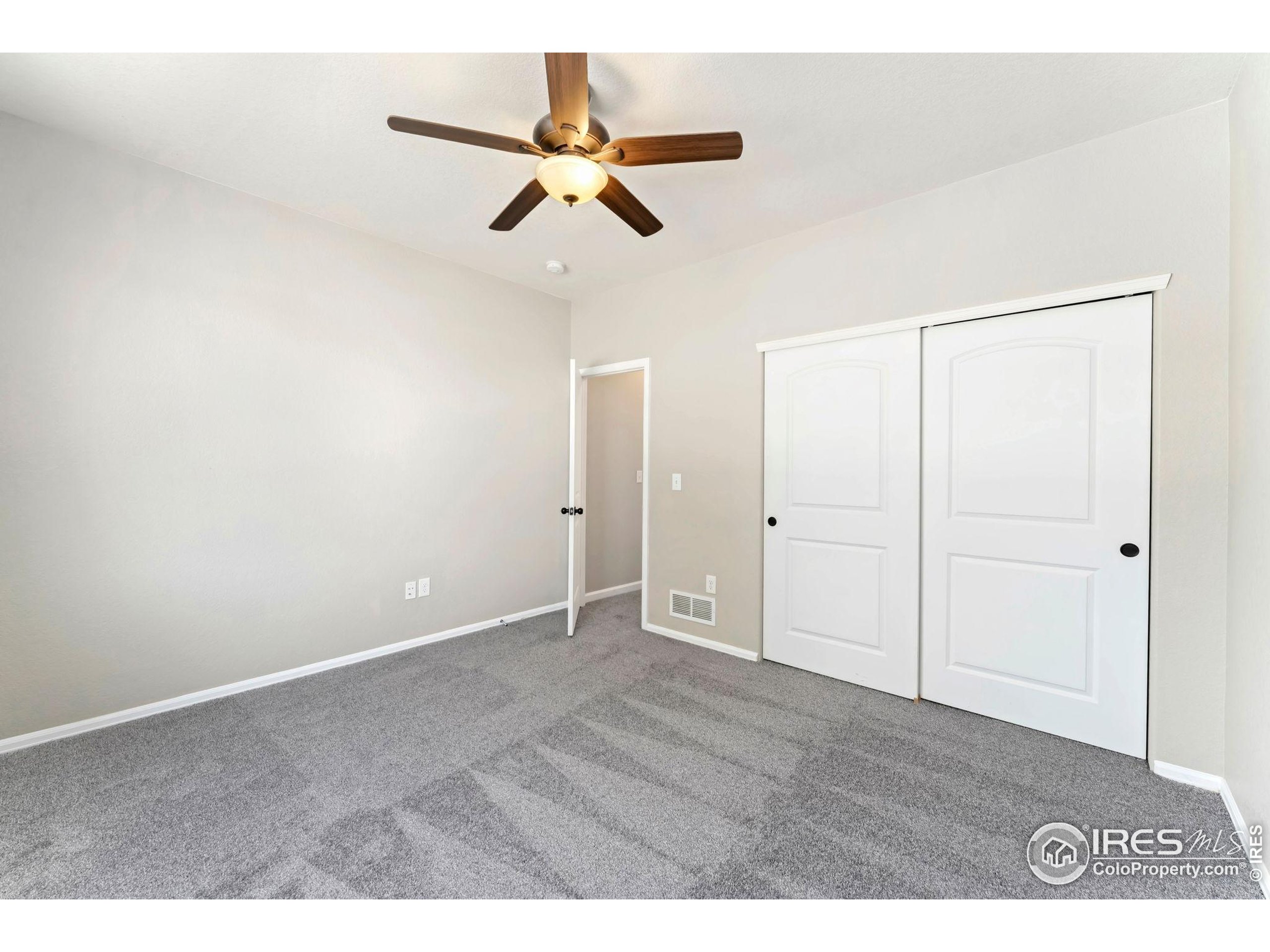 11449 Coal Ridge Street Firestone, CO 80504 - Photo 20 of 33 a view of an empty room