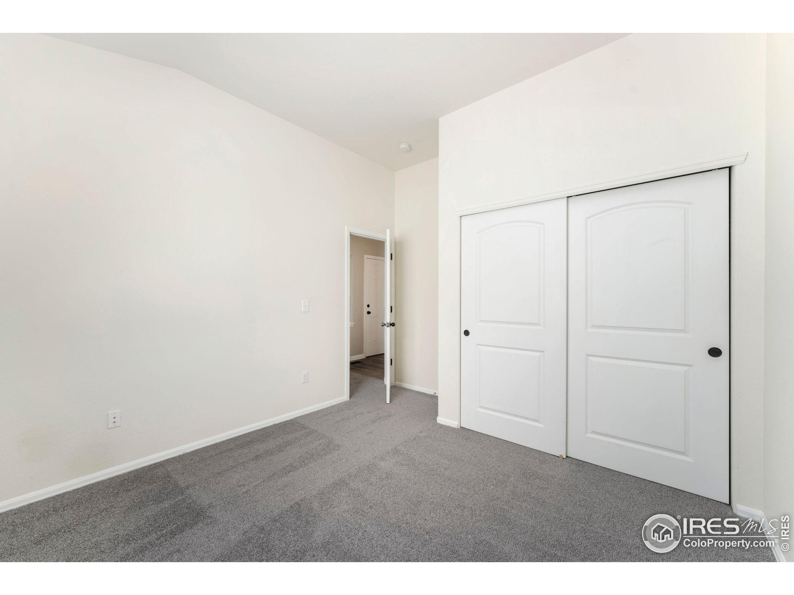 11449 Coal Ridge Street Firestone, CO 80504 - Photo 21 of 33 a view of an empty room