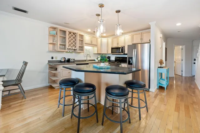 a bedroom with a bed and a view of bathroom